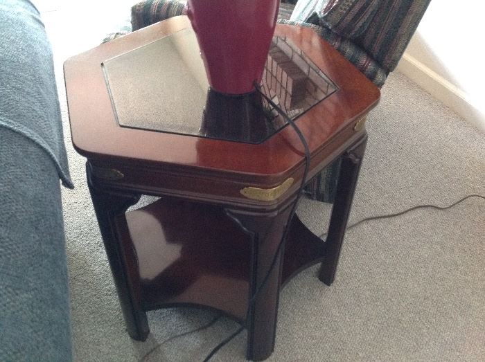 We have 2 of these Octagon Wood/Glass End Tables