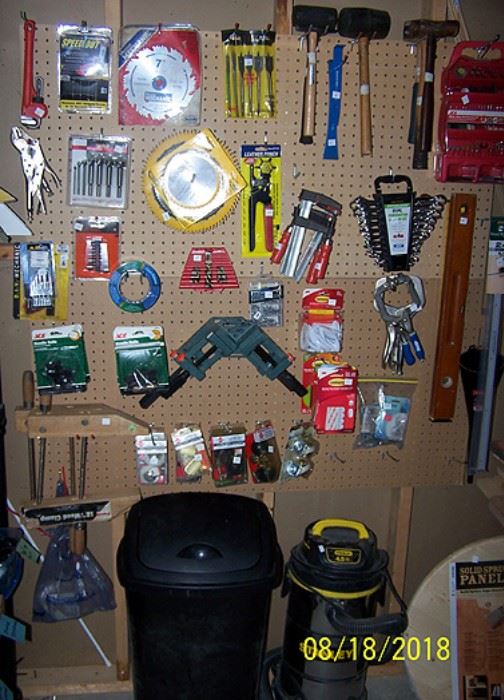 Wall of misc. tools, Stanley shop vac