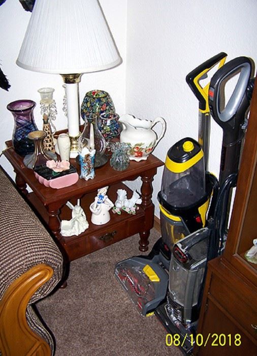 End table, lamp, Shark sweeper and Bissell cleaner