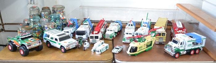 COLLECTION OF HESS TRUCKS AND OLD MARBLES