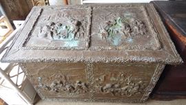 Embossed copper kindling box.