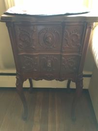 Pair of ornate side tables