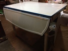 My personal favorite! Porcelain drop-leaf table with drawers on both ends. I can see this in someone's country kitchen!