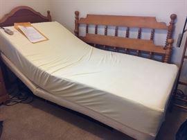 Sleep EZZ twin adjustable bed.  Head and feet raise as well as the height of the bed.
