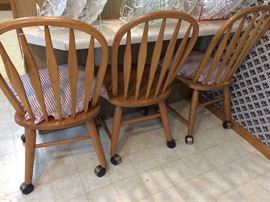 3  short counter top chairs