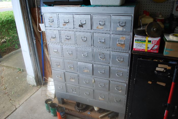 This is a Great Tool/Parts Storage Cabinet. It Consists of (3) 10-Drawer Cabinets, a Base and a Top Cover. (5) Pieces.