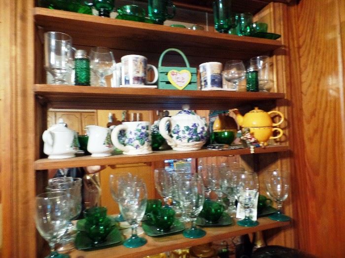 Lots of china and colorful glass