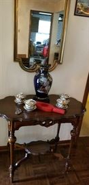Elegant entry table with Asian treasures