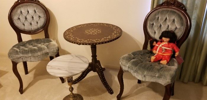 Vintage chairs and stylish side tables