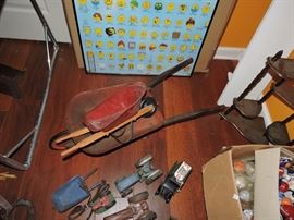 Childs wheelburrow with 2 tools