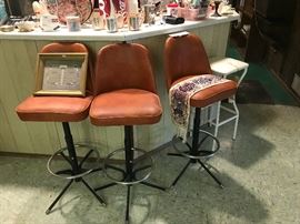 Set Of Three Vintage Orange Vinyl Barstools With Black And Chrome Bases