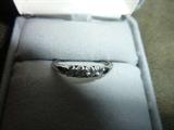 Ladies 18K white gold diamond band.  4 round brilliant cut diamonds .04 carat weight each, .16 total carat weight. color G-H, Clarity SI1 w/appraisal