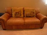 Lane leather couch - (2) thrown pillows