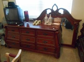 another dresser with mirror and a free tv!