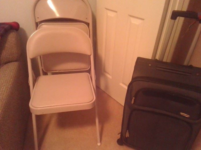 Set of four gently used card table chairs
