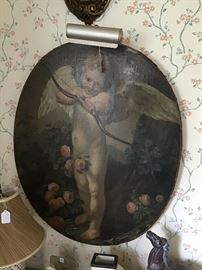 Antique image of a Cupid mounted to canvas