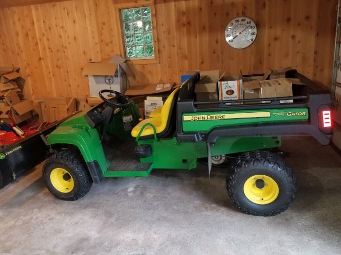2010 JOHN DEERE GATOR TX WITH LIFT BED AND SNOW PLOW ASKING $ 5,000.00