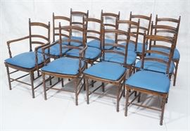 Lot 137 Set of 12 Ladder Back Dining Chairs. Caned seats.