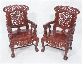Lot 291 Pr Carved Wood Asian Arm Chairs. Carved back with