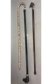 Lot 319 Lot of 3 Canes Walking Sticks. 1 Carved wood dog