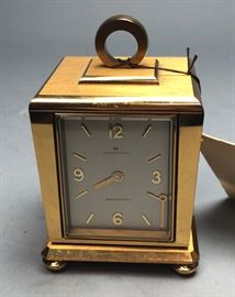 Lot 583 HAMILTON Electronic Clock. 4 sided gilt metal cas