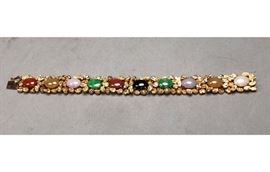 Lot 573 18K Gold Modernist Ladies Bracelet. 10 semiprecio