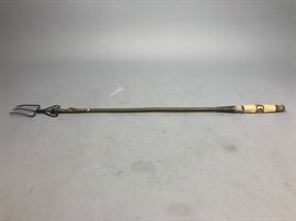 Lot 511 Carved Handled Early Metal Fork. Iron tines in br