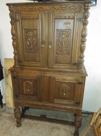 Ornate chest on chest armoire
