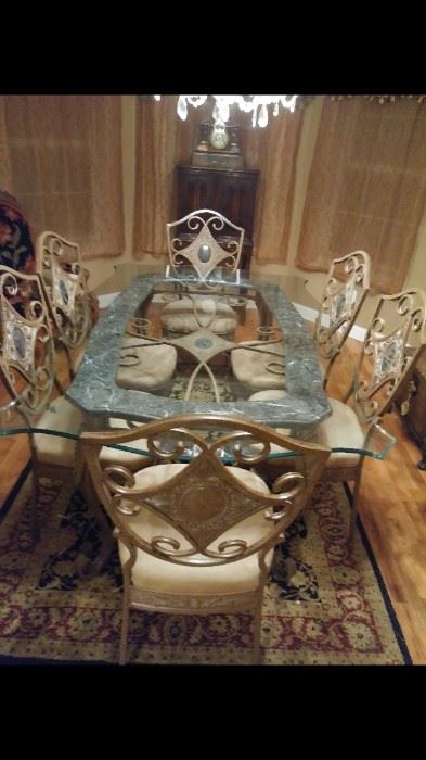 Beautiful Glass, Iron and Marble Dinning Room table and chairs