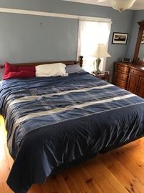  King-size bed which is part of bedroom set 