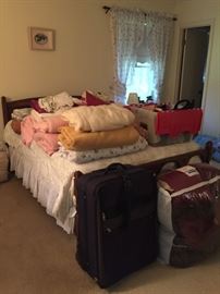 Double bed with linens