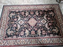 Black, red and cream wool rug, 5 1/2' x 7 1/2'