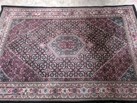black with pink wool rug, 7' x 9'