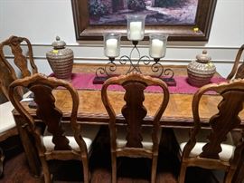 Dining room table with 6 chairs and three 18" leaves.  Absolutely beautiful burled wood pattern