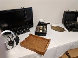 Vintage typewriter and 10 key machine.