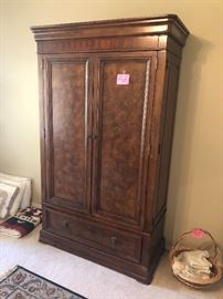 Ethan Allen Armoire with tons of storage and closet capability!