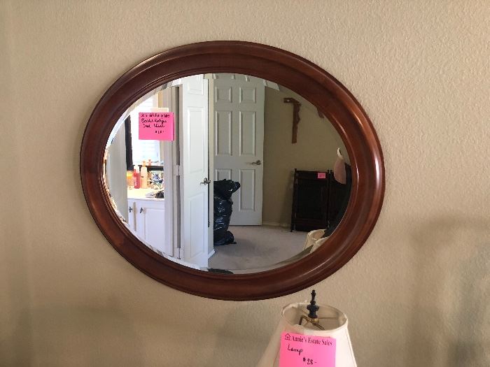 Beveled oval mirror
