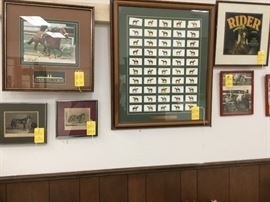 Large collection of racing memorabilia including pictures of famous racehorses.