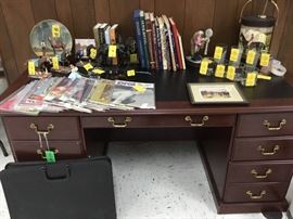 We have lots of Racing memorabilia including Kentucky Derby glasses, Bobble head horses including “Smarty Jones”, books and pictures. If you like horse racing, you will love all this!
