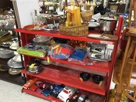 Another picture of items on red shelf
