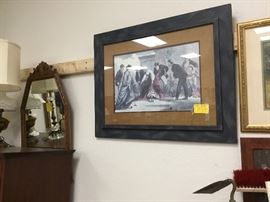 Lots of framed art work and pictures
