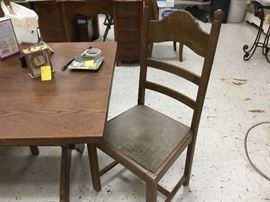 This is the second oak table with 6 chairs