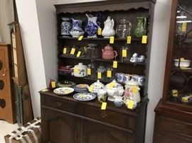Buffet with open shelves, more stoneware