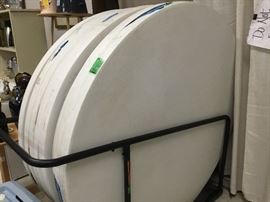 Still have these great big round tables in a rolling cart! Owner wants to sell all together with cart.