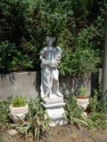 One of FIVE life size garden statues