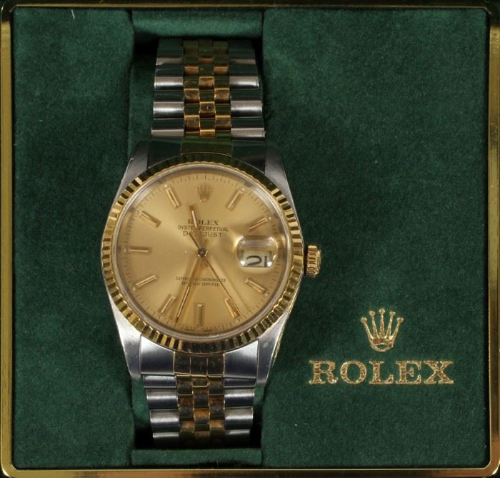 ROLEX GENT'S OYSTER PERPETUAL 18KT AND STAINLESS WRISTWATCH
Lot # 2080 