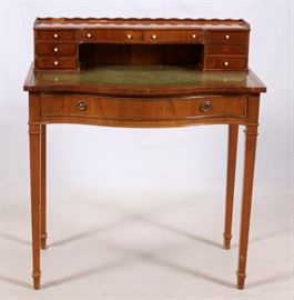 TOOLED-TOP LEATHER MAHOGANY WRITING DESK, H 36", W 31 1/2", D 17"
Lot # 1206 