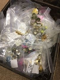 Tub of earrings