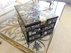 Black Lacquer and mother of pearl inlaid jewelry box.