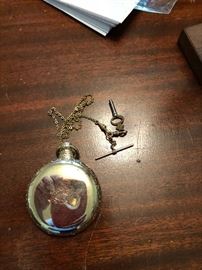 Gold pocket watch and fob